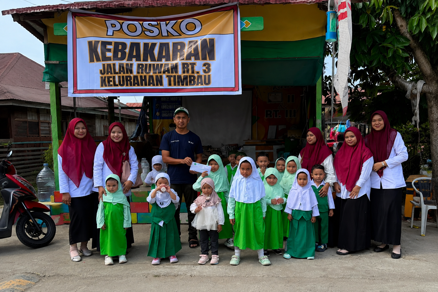 Siswa RA Asy-Syauqi Salurkan Bantuan untuk Korban Kebakaran di Jalan Ruwan RT 3 Kelurahan Timbau